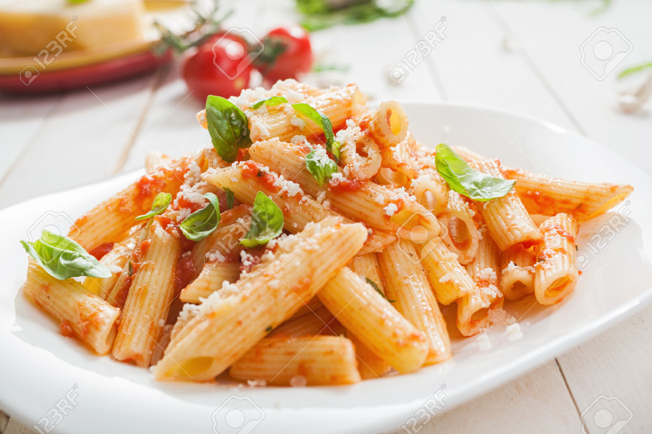 Serving of spicy savory italian penne pasta