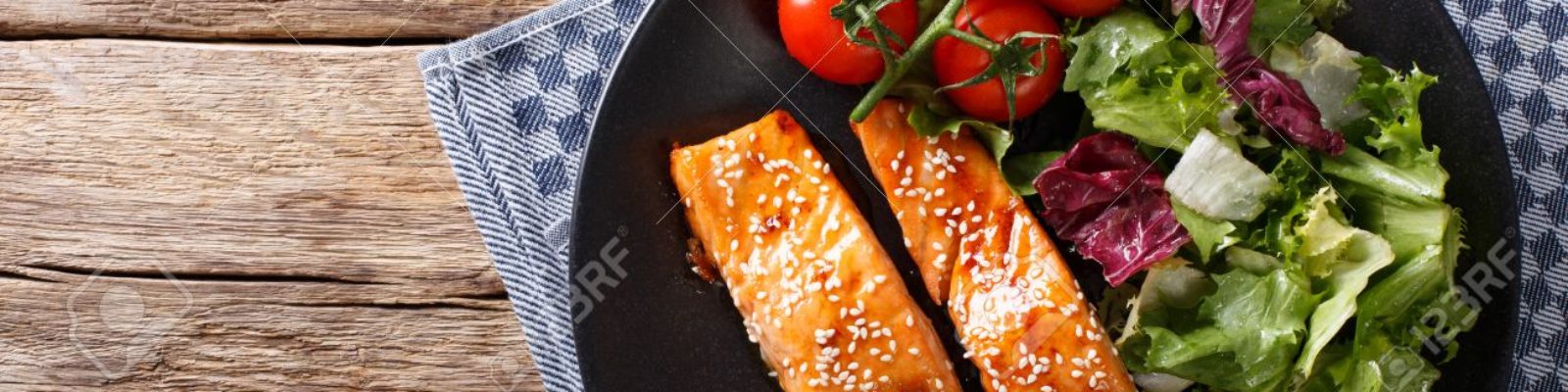 cropped-76503978-Salmon-with-sesame-seeds-in-Asian-style-and-fresh-salad-close-up-on-a-plate-horizontal-view-from-abo-Stock-Photo.jpg