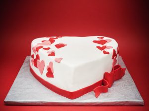 Cake in shape of heart.